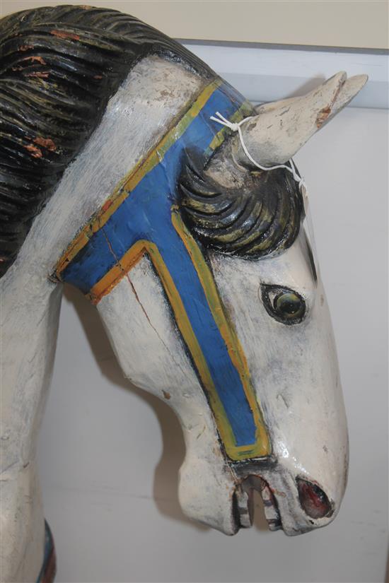A carved and painted carousel horse, attributed to the Philadelphia Toboggan Company, 3ft 8in.